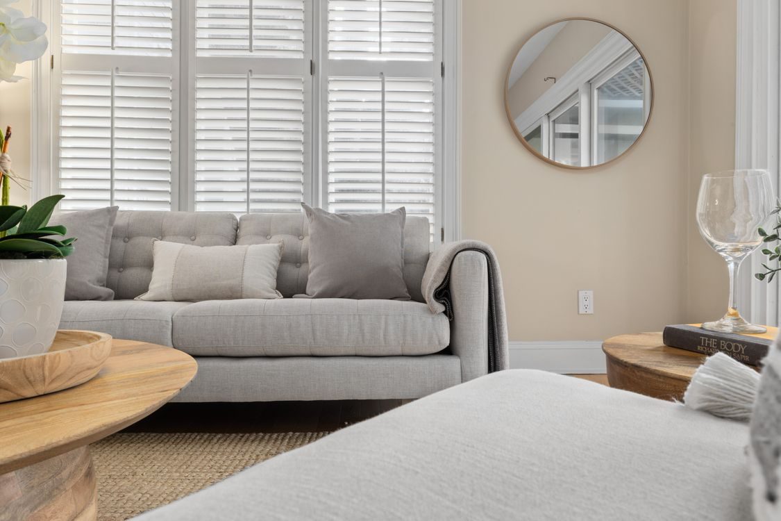 Bright living room with a sofa and natural light