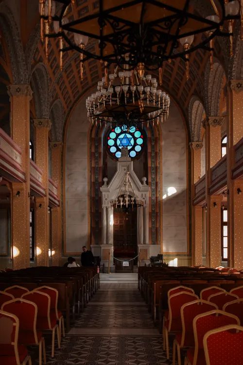 Synagogue interior with stained glass — illustrative concept
